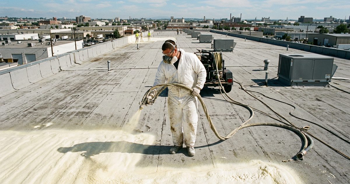 Spray polyurethane foam roofing applied over a commercial flat roof — Conklin Roofing Vs Spray Foam Roof: 7 Costly Problems