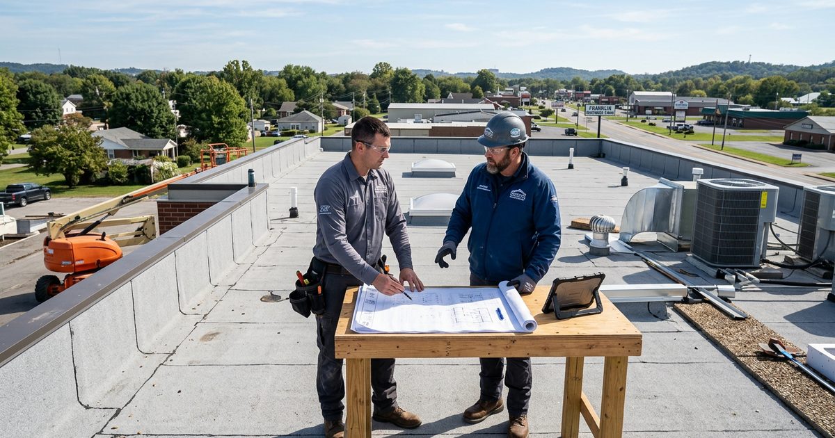 Conklin-trained commercial roofing contractor working on a rooftop — Flat Roofing Contractor In Franklin Kentucky